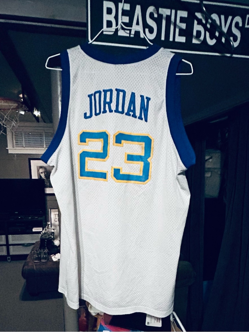 Jordan White Basketball Jersey with Blue and Yellow Accents